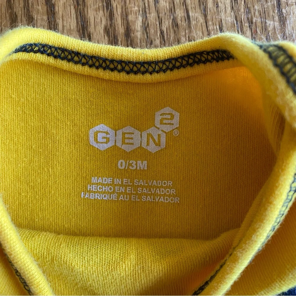 U of M Yellow Baby One-Piece Bodysuit